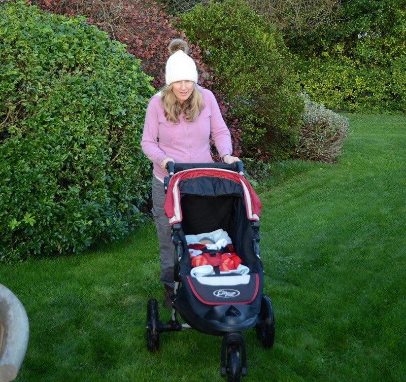 A 3 day old newborn's trip around the garden - this exposure to day light is key to make the switch from sleeping all day to sleeping all night