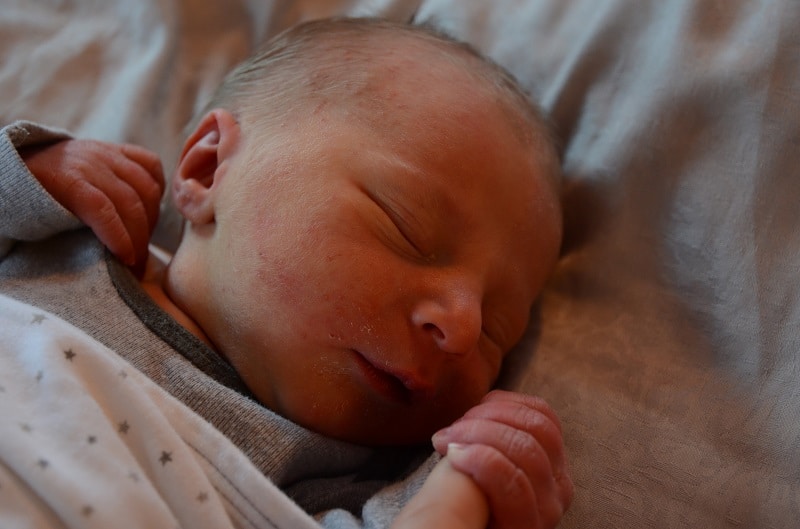 It's hard to establish a newborn breastfeeding schedule when baby is very sleepy