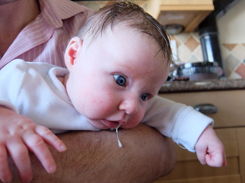 delay tub bathing your newborn is she's prone to spit-up