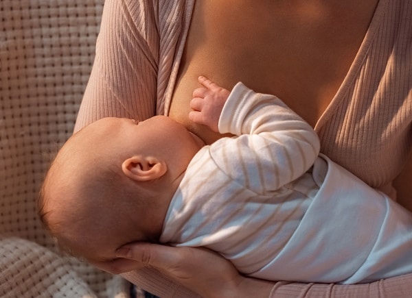 Make sure baby's mouth and throat are higher than the stomach when feeding