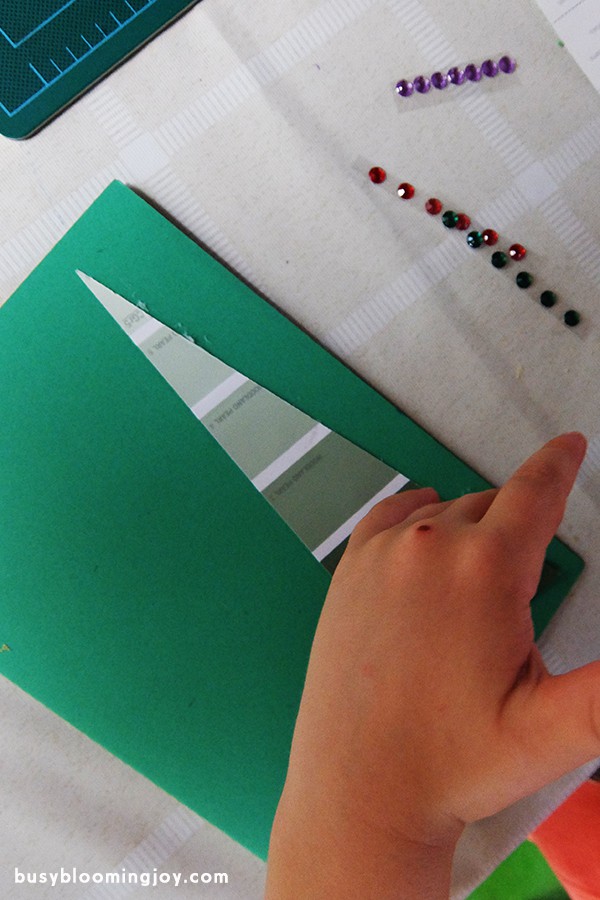 Sticking paint chip onto Christmas tree card