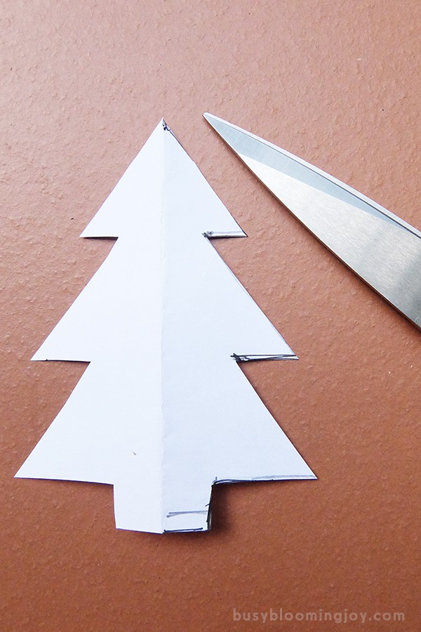 cut out christmas tree outline to make a template