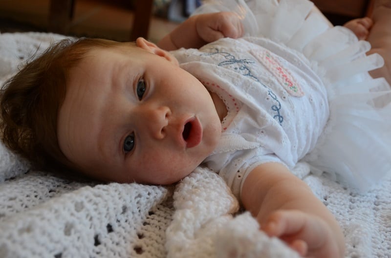 1950s BABY MAKING FUNNY FACE WITH WIDE OPEN EYES THIN MOUTH PURSED LIPS  LOOKING AT CAMERA Stock Photo - Alamy