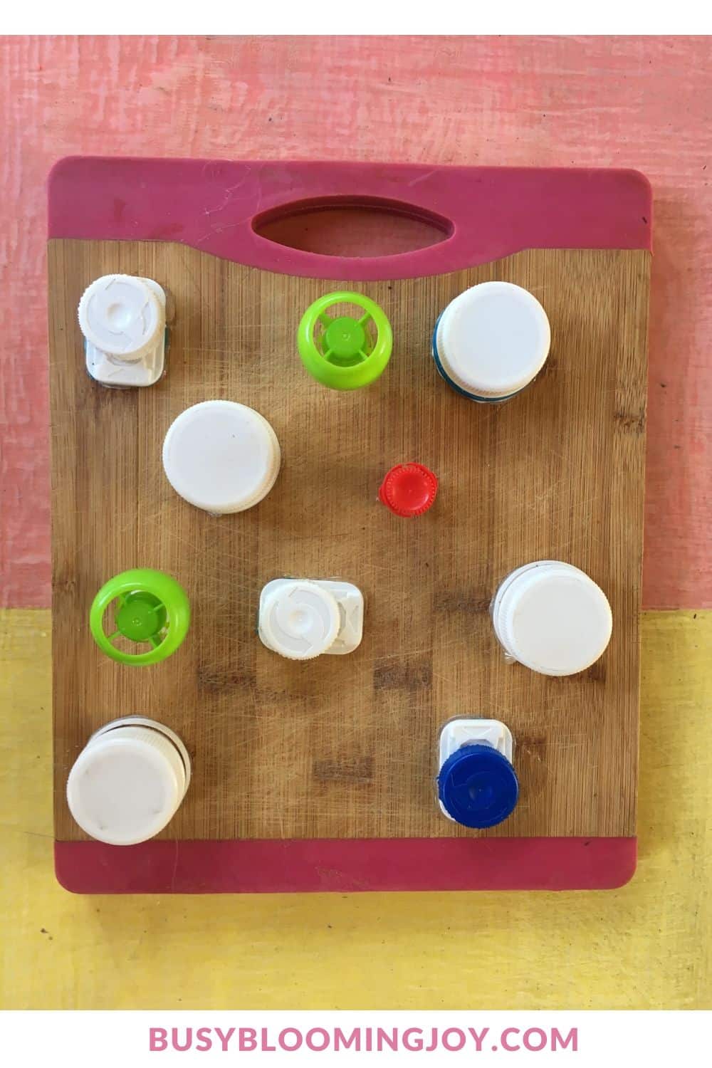 DIY fine motor toy with lids on