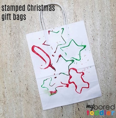 Christmas cookie cutter stamped gift bag for toddlers from myboredtoddler
