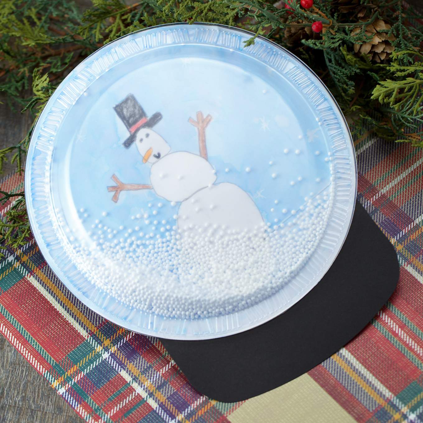 Snowman snow globe Christmas craft for preschoolers