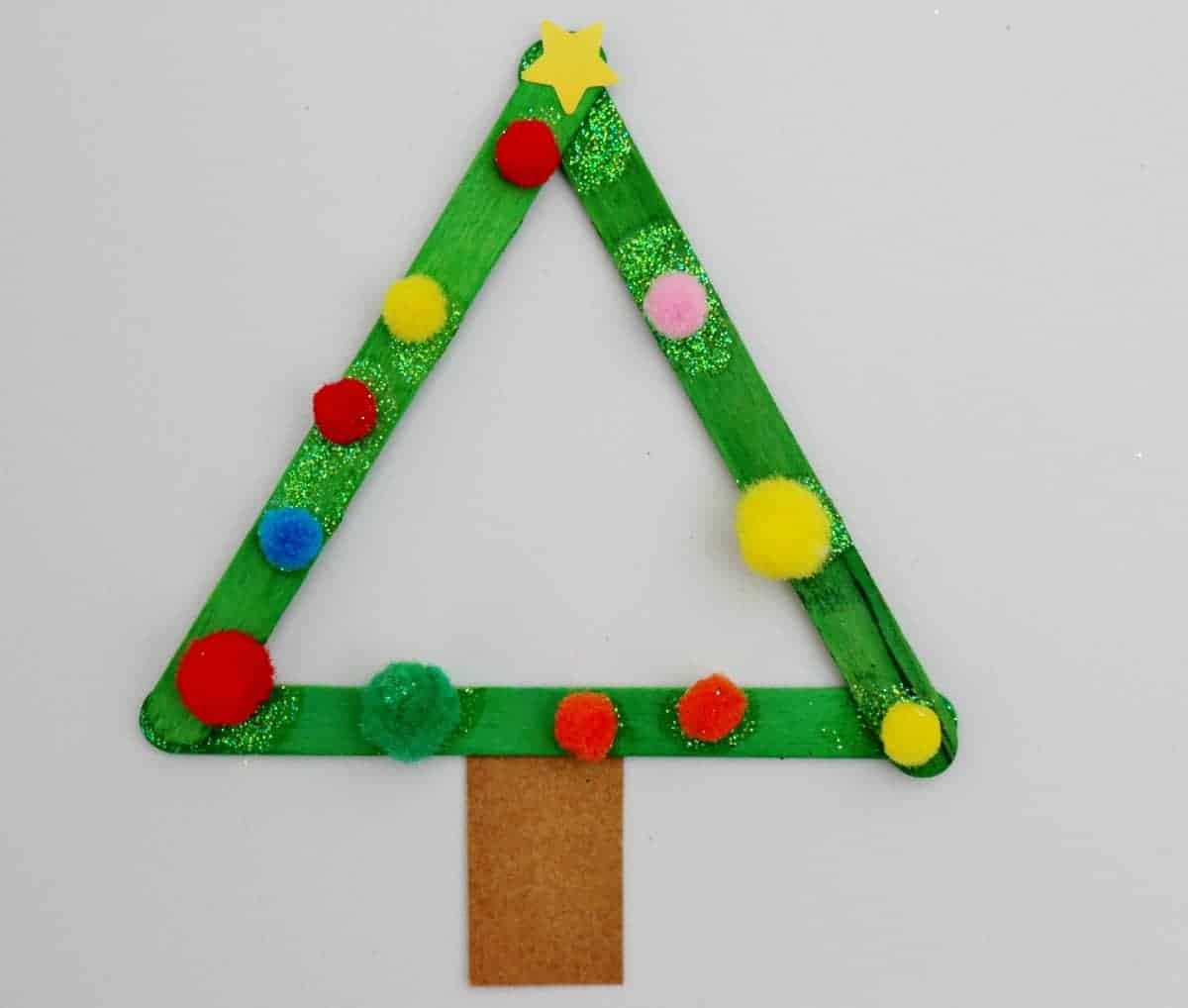 Christmas tree craft for toddlers using craft sticks