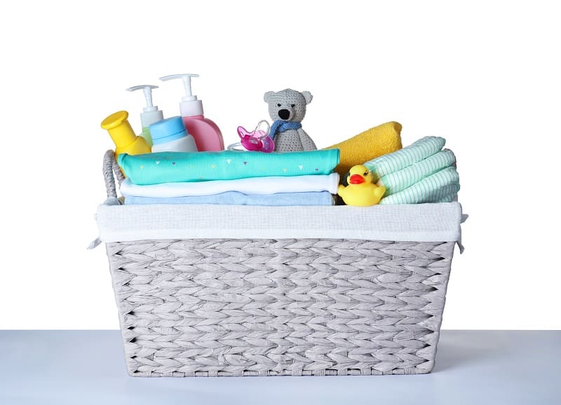 Gather supplies and baby bath products before starting to bathe your newborn