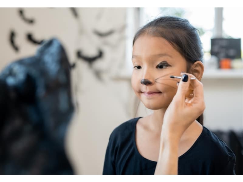 Offer face painting at your toddler Halloween party