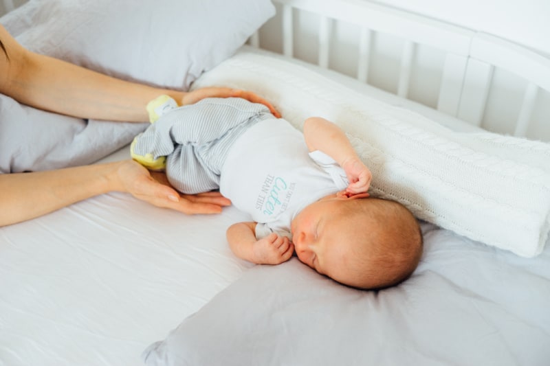 practicing a safe sleep routine is essential when trying to get baby to sleep without being held