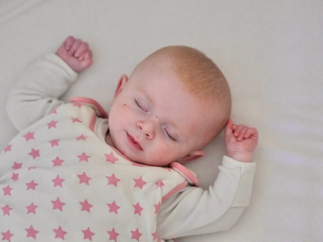 Can a baby burp while sleeping?