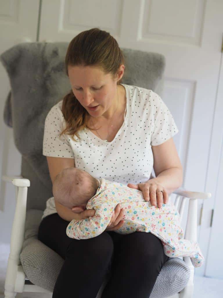 burping a sleeping baby while you're sitting down