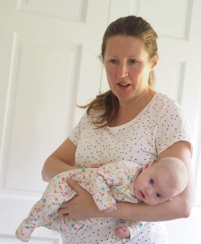 The colic carry can be good to burp a sleeping baby