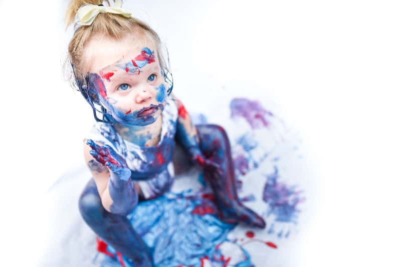 Your 1 and 2 year old can enjoy sensory activities with these dry messy play ideas, without looking like this!