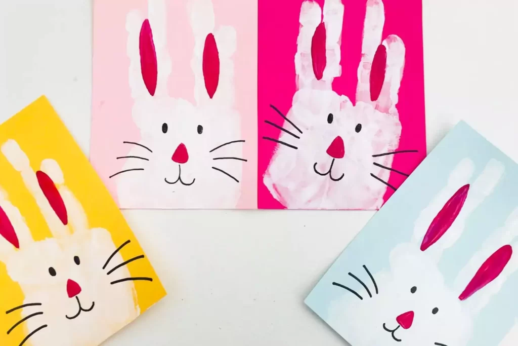Easter Bunny Handprint Craft from Mas And Pas