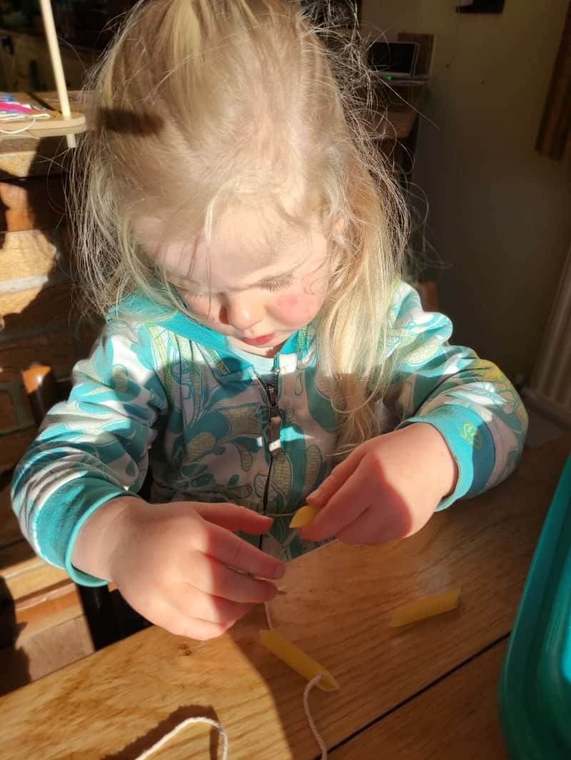Making a pasta necklace