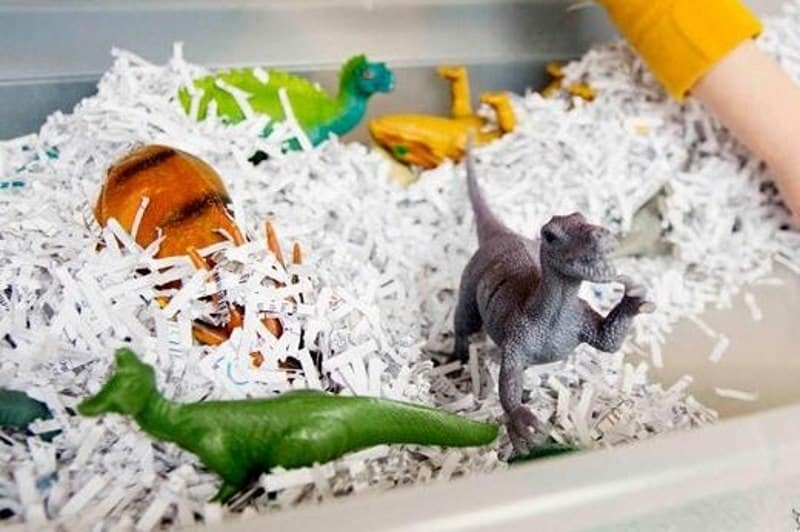 For an easy dry messy play idea, try some shredded paper and toys 