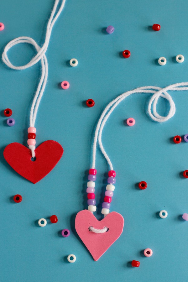 Heart necklace craft for toddlers to make for Mothers Day from Make And Takes