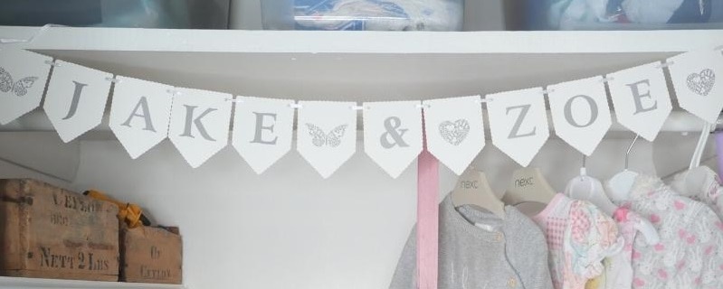 decorating and personalizing baby's closet for some cuteness