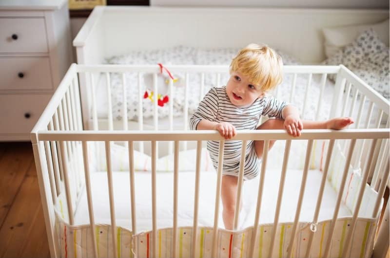 1 year old climbing out of cot best sale