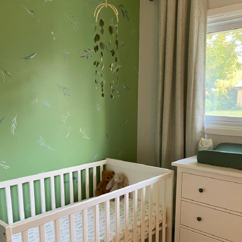 botanically-inspired green nursery for the baby