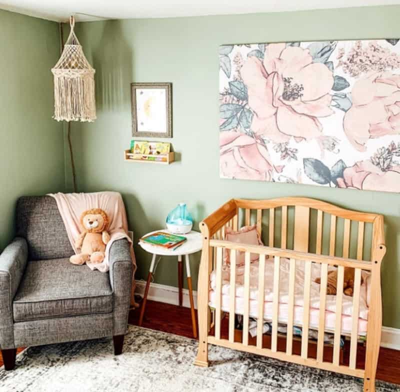 sage green nursery ideas with floral accent