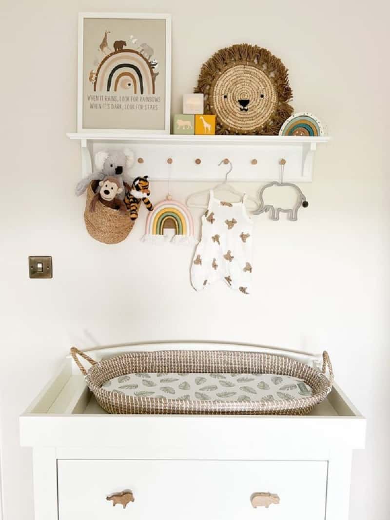 Shelves over outlet changing table