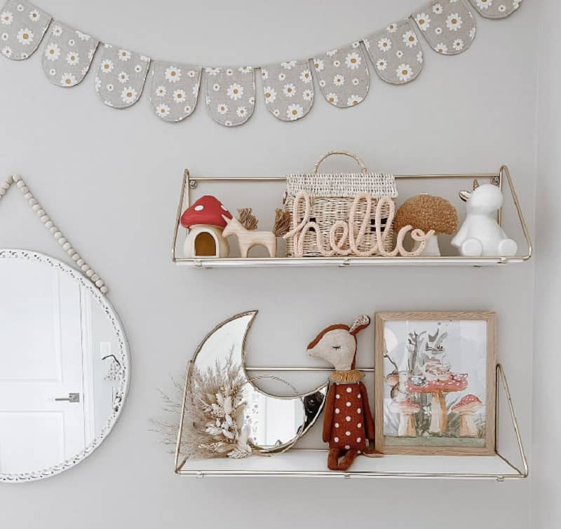 soft colors nursery wall shelves