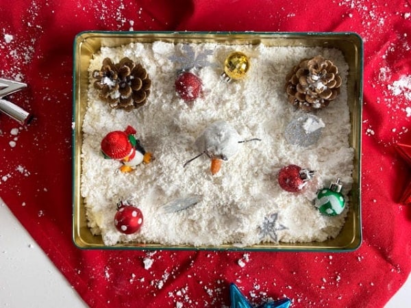 fake Christmas snow sensory bin for toddlers