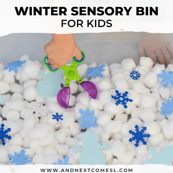 snowy sensory bin using cotton balls and some fake snowflakes