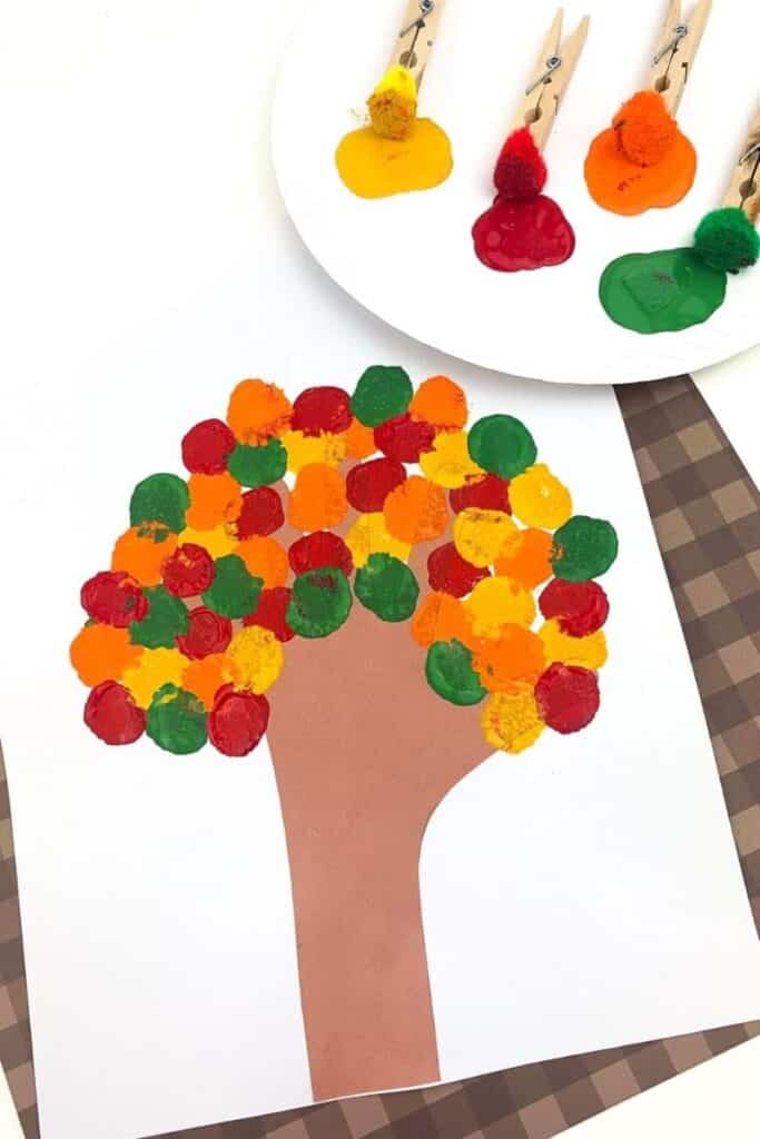 Fall tree painting craft using pom-poms