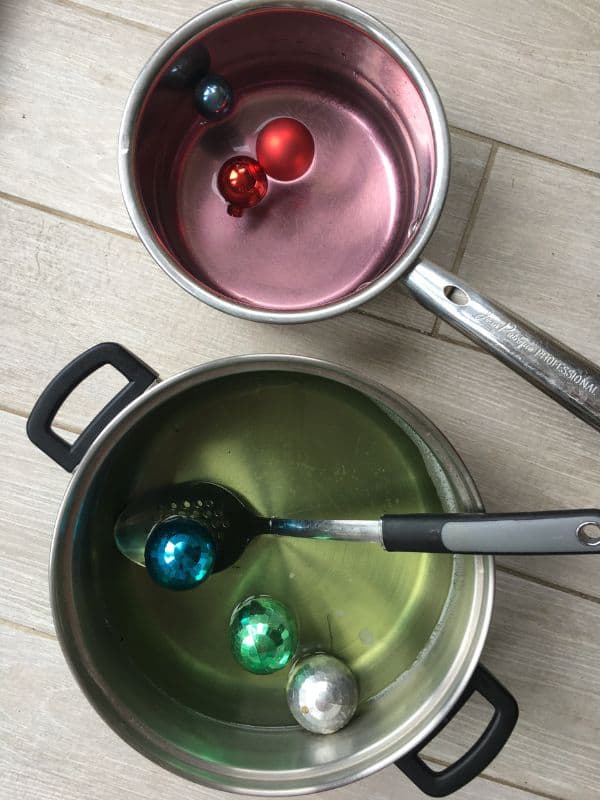 water scooping sensory play activity for toddlers at Christmas