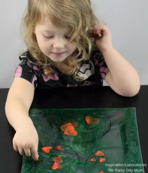 Grinch Heart Sensory Bag for sensory play for toddlers and preschoolers