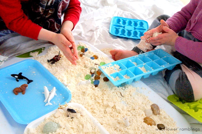 toddler winter sensory bin complete with arctic animals