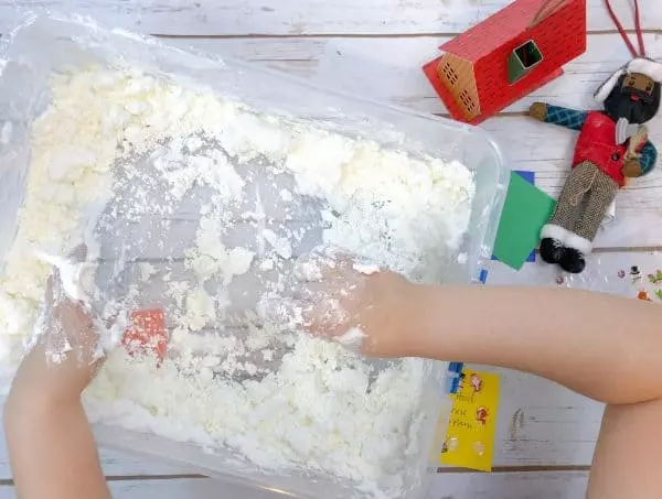 fake snow activity for toddlers based on jolly christmas book