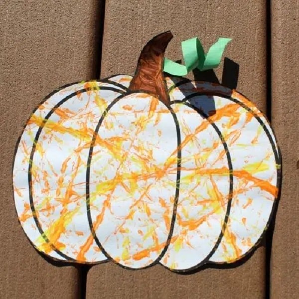 pumpkin marble painting for an easy fall craft activity for infants and toddlers