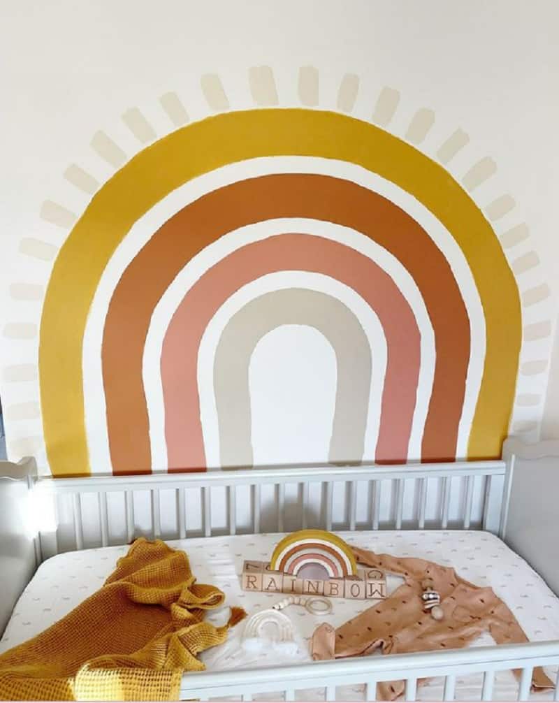 Fall-colored boho rainbow nursery wall idea