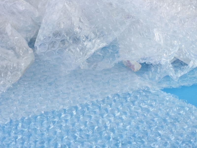 Walking And Crawling On Bubble Wrap for a fun sensory play activity