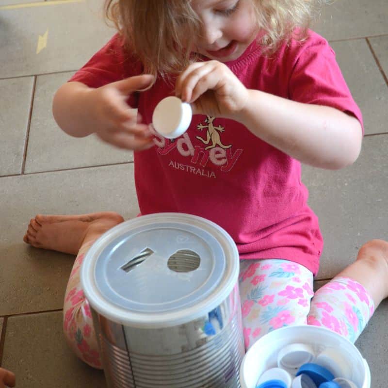 bottle top activity to do at home with your 12 month old