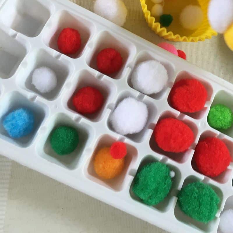 Pompoms and ice cube trays sensory play activity for 1 year old