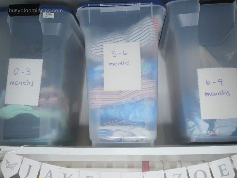 Store bagged and labeled clothes in large labeled bins 