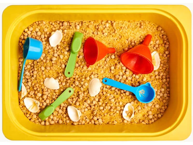 sensory table and bin fillers to strengthen fine motor skills for toddlers