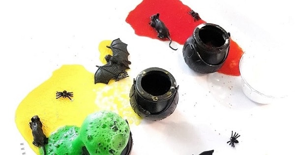 Colourful Witches Potion Science Experiment for kids to make this Halloween