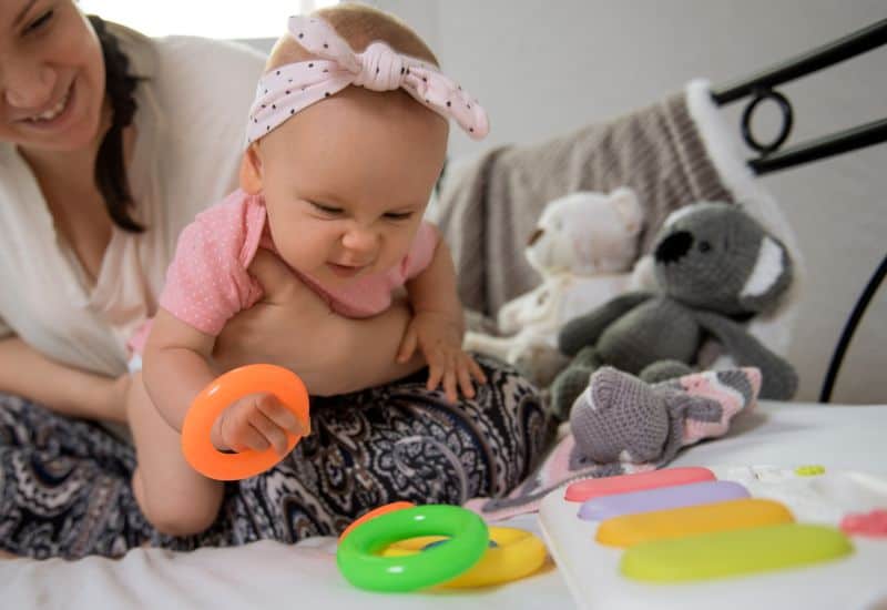 fine motor skills and developmental activities for three month old 