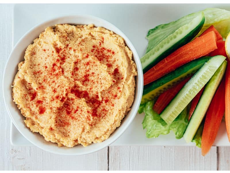 Hummus with bread and veggies for easy snacks 