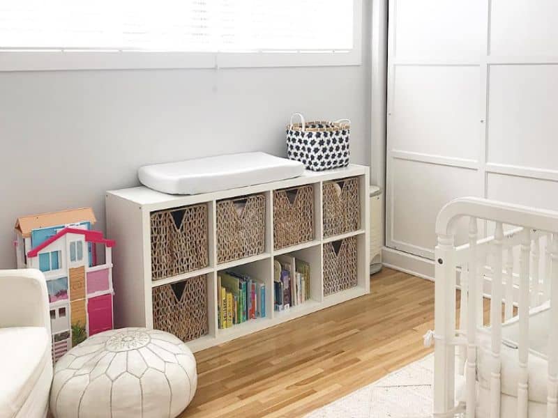nursery bookshelf with storage for toys and baby essentials