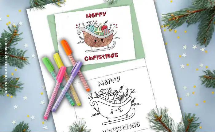 One of the printable Christmas cards for kids to color displayed with a finished card colored, cut out and folded