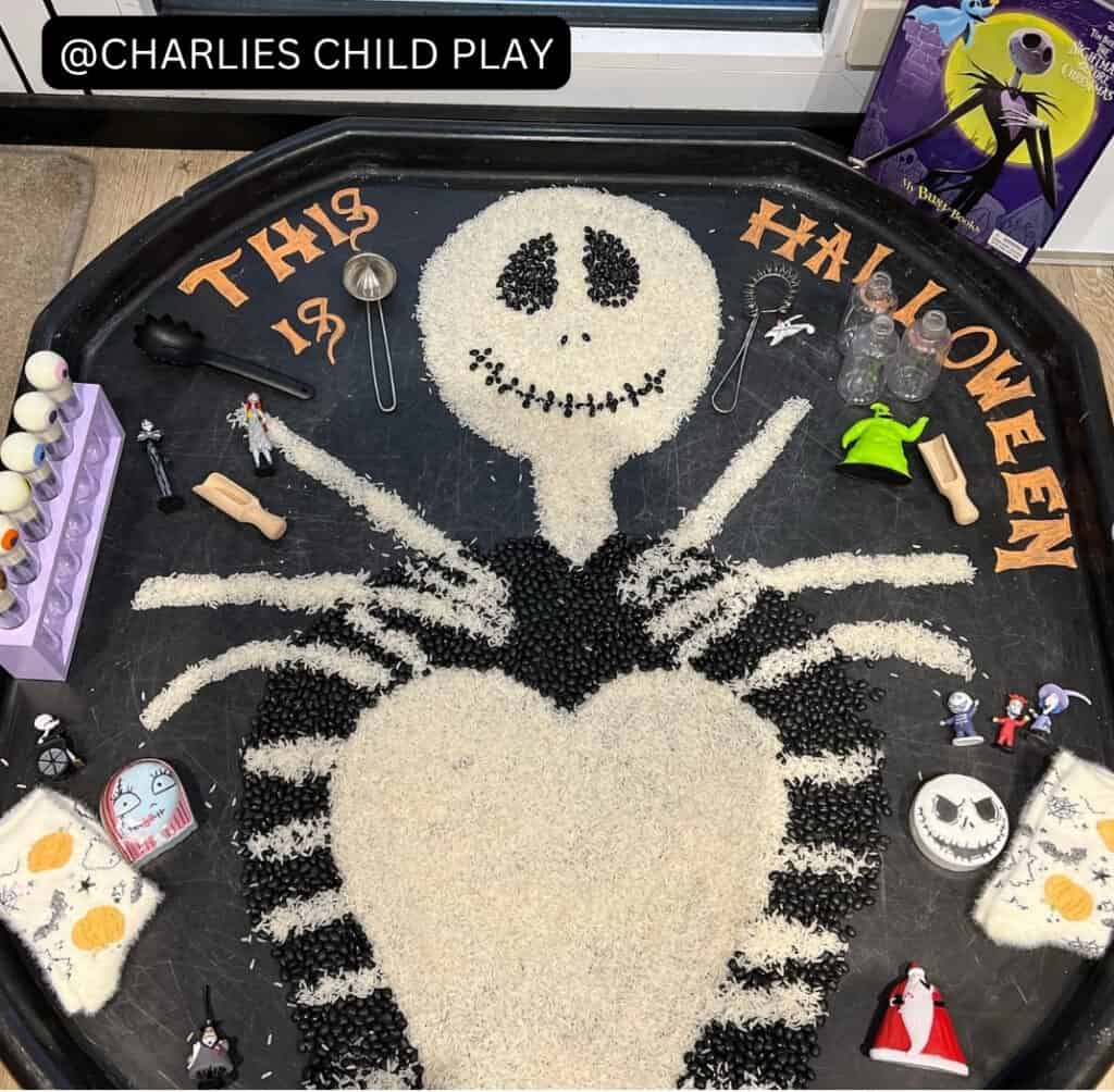 skeleton rice halloween sensory activity in a tuff tray