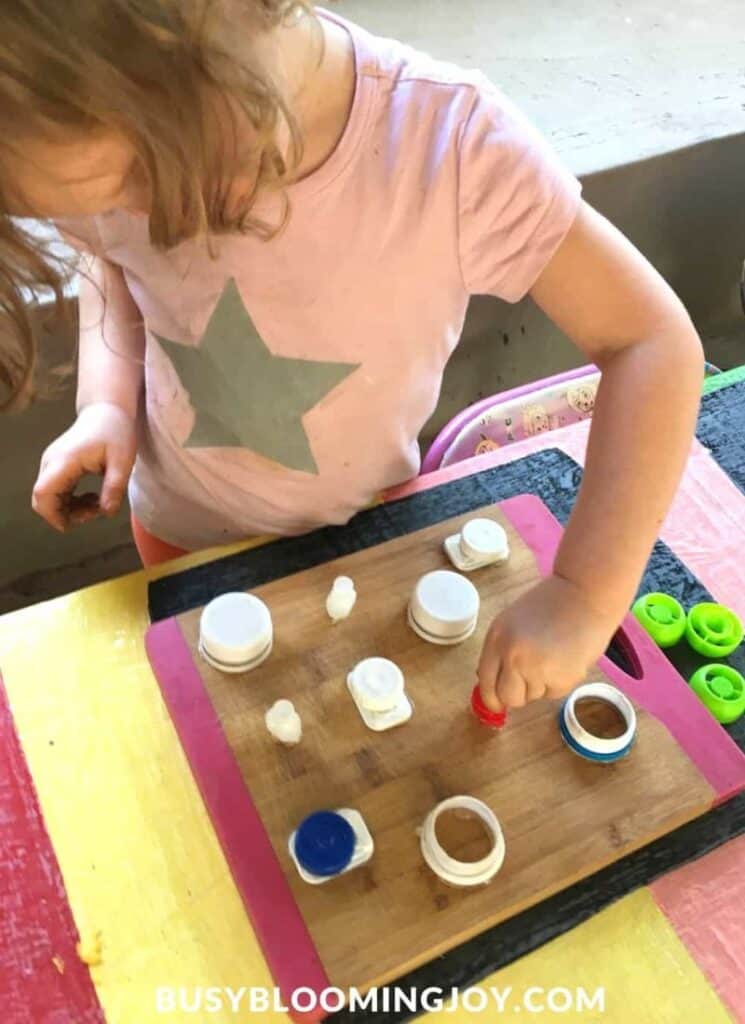 Screwing & Unscrewing Bottle Tops to help strengthen arms & wrist