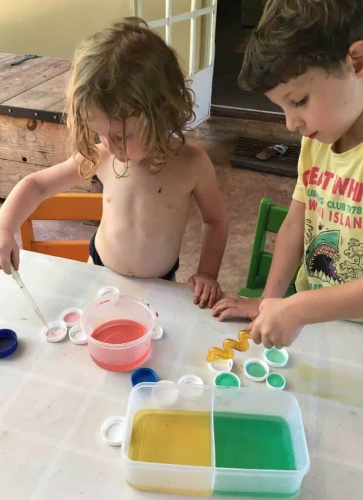 Squeezing with Pipettes - color mixing activity for kids